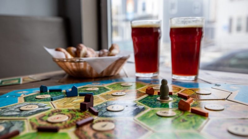 board games, with beer, and snacks